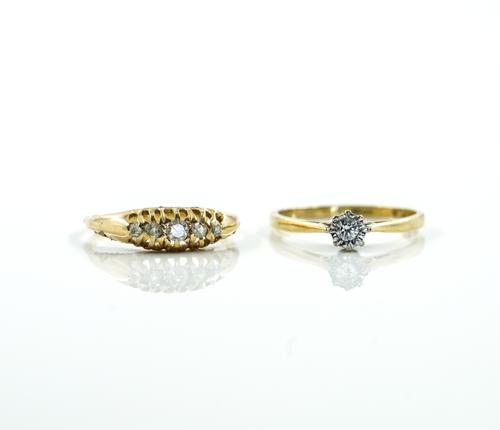 TWO GOLD AND DIAMOND RINGS (2)