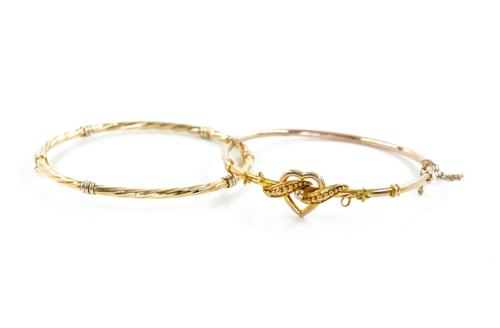 TWO 9CT GOLD BANGLES (2)