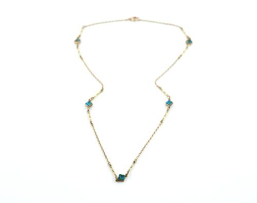 A GOLD AND ENAMEL NECKLACE