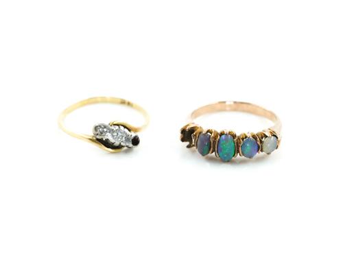 A GOLD AND OPAL RING AND A GOLD AND DIAMOND RING (2)