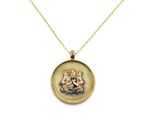 A 9CT GOLD AND ENAMELLED ATHLETIC'S MEDAL, WITH A GOLD NECKCHAIN (2)