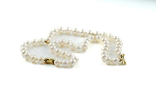 A TWO ROW BRACELET OF CULTURED PEARLS