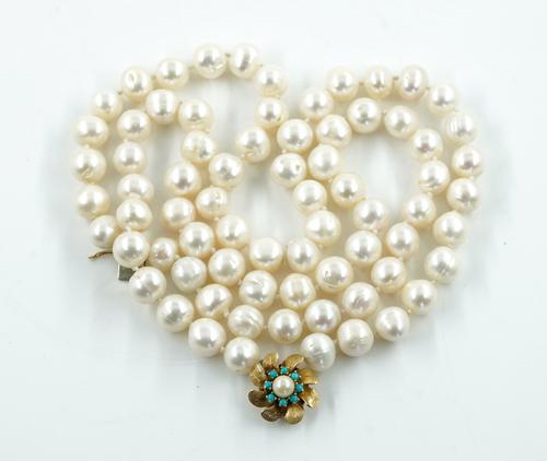A TWO ROW NECKLACE OF BAROQUE CULTURED PEARLS
