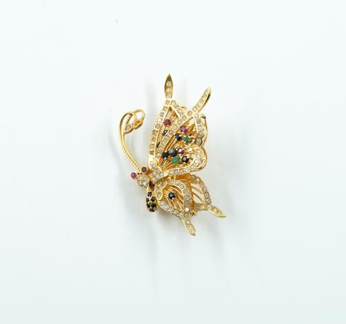A GOLD, DIAMOND AND VARICOLOURED GEMSTONE PENDANT BROOCH