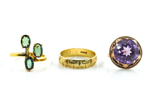 TWO GOLD AND GEM SET RINGS AND AN 18CT GOLD WEDDING RING (3)
