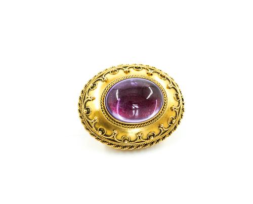 A VICTORIAN BANDED AGATE AND AMETHYST BROOCH