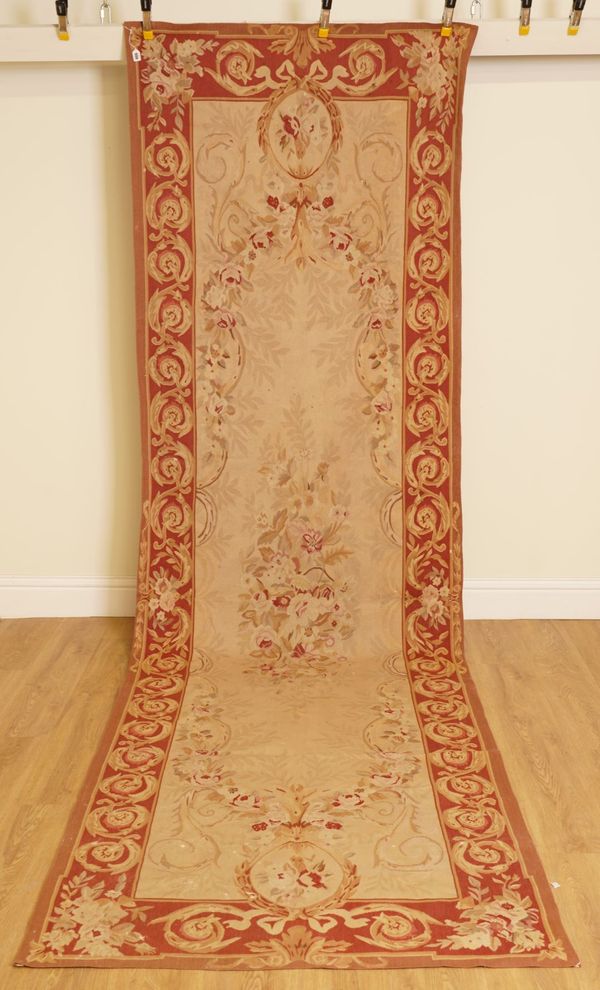 AN AUBUSSON STYLE WOVEN RUNNER