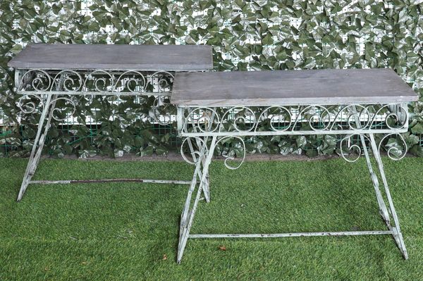 A PAIR OF PAINTED WROUGHT IRON AND WELSH SLATE MOUNTED CONSOLE OR OCCASIONAL TABLES (2)