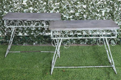A PAIR OF PAINTED WROUGHT IRON AND WELSH SLATE MOUNTED CONSOLE OR OCCASIONAL TABLES (2)