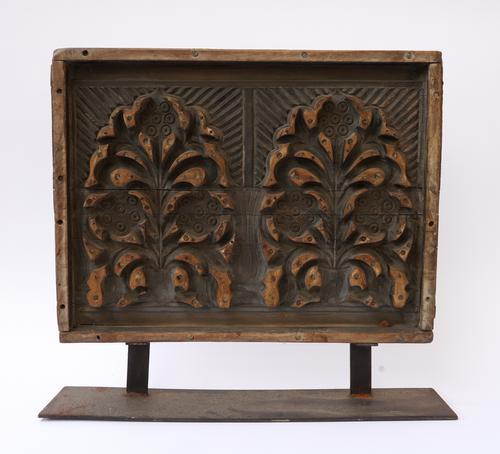 AN INDIAN CARVED WOODEN PRINTING BLOCK