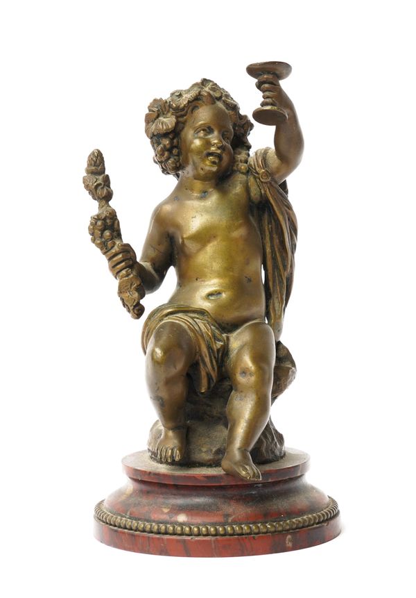 AFTER BOUCHER: A BRONZE SEATED BACCHANALIAN CHERUB