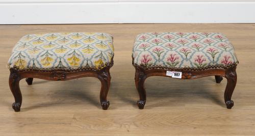 A PAIR OF VICTORIAN MAHOGANY FRAMED FOOTSTOOLS (2)