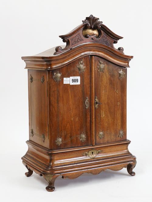 A MINIATURE WALNUT TWO DOOR ARMOIRE
