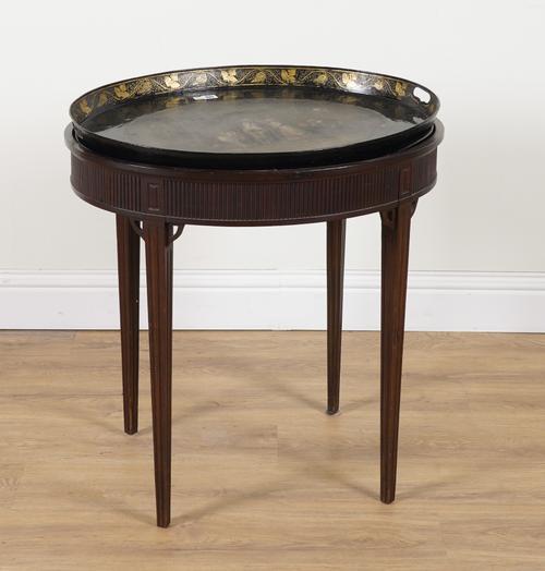 A REGENCY TOLEWARE PAINTED OVAL METAL TRAY