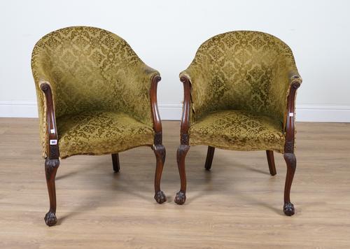 A PAIR OF GEORGE I STYLE MAHOGANY FRAMED TUB BACK CHAIRS (2)