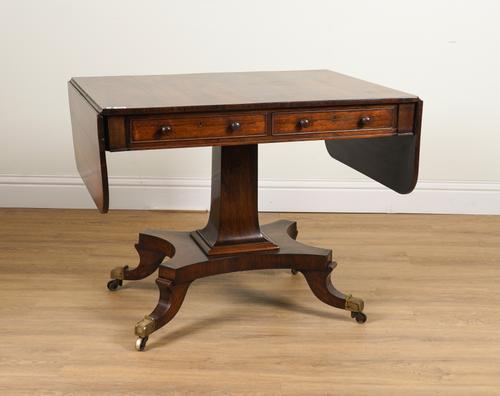 A REGENCY ROSEWOOD TWO DRAWER CENTRE TABLE