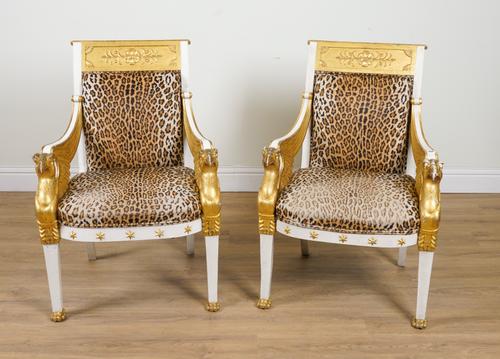 A PAIR OF EMPIRE REVIVAL PARCEL-GILT CREAM PAINTED OPEN ARMCHAIRS (2)