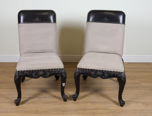 RALPH LAUREN: A PAIR OF CARVED AND EBONISED SIDE CHAIRS (2)