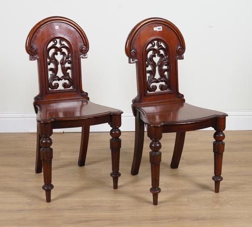 A PAIR OF EARLY VICTORIAN MAHOGANY HALL CHAIRS (2)