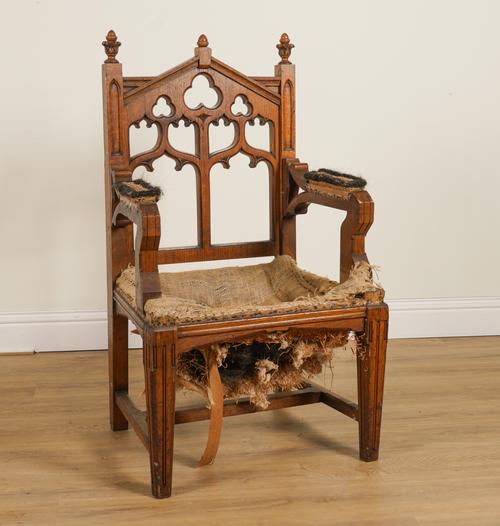 A VICTORIAN OAK GOTHIC REVIVAL OPEN ARMCHAIR