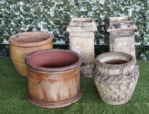 A PAIR OF SQUARE TERRACOTTA CHIMNEY POTS (5)