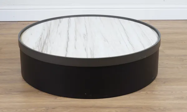 A MODERN CIRCULAR LOW COFFEE TABLE