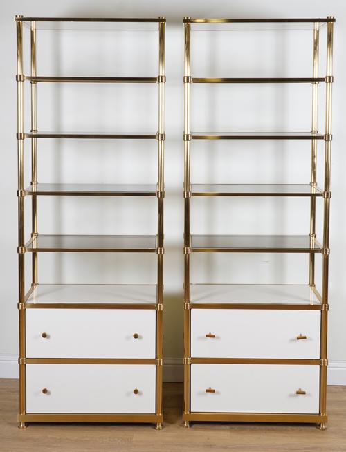 A PAIR OF BRASS FLOOR STANDING OPEN BOOKCASES