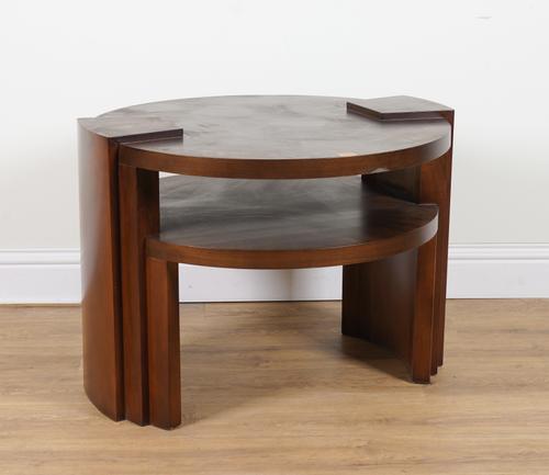 A MID 20TH CENTURY TWO TIER CIRCULAR WALNUT COFFEE TABLE