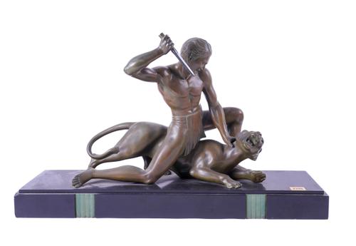PIERRE HUGONETT (FRENCH, FL. EARLY 20TH CENTURY); AN ART DECO FRENCH BRONZE GROUP OF HUNTER AND PANTHER