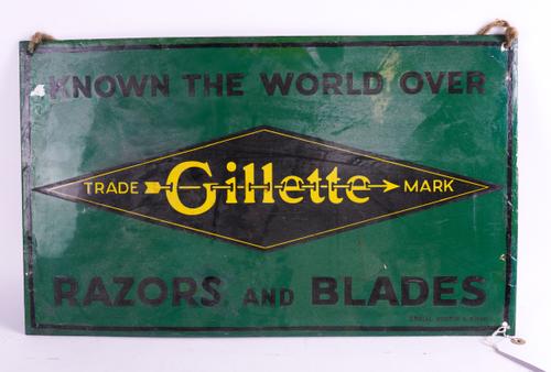 GILLETTE “KNOWN THE WORLD OVER RAZORS AND BLADES”, AN ENAMEL SIGN