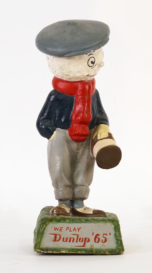 DUNLOP, A MID 20TH CENTURY ADVERTISING FIGURE MODELLED AS A MAN WITH A GOLF BALL HEAD, “WE PLAY DUNLOP 65”