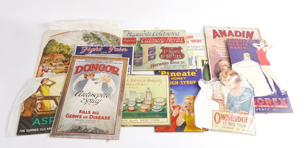 A GROUP OF TWELVE EARLY 20TH CENTURY CARD ADVERTISING SIGNS (12)