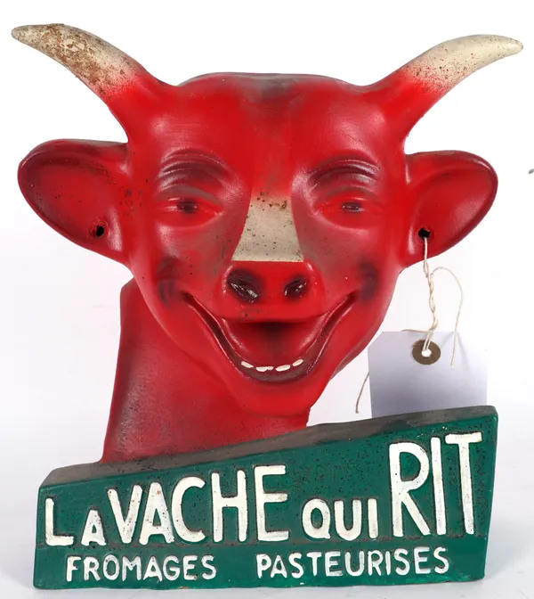 LA VACHE QUI RIT (THE LAUGHING COW) AN ADVERTISING FIGURE MODELLED AS A RED BULL