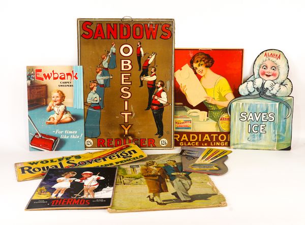 A GROUP OF EIGHT CARD ADVERTISING SIGNS (8)