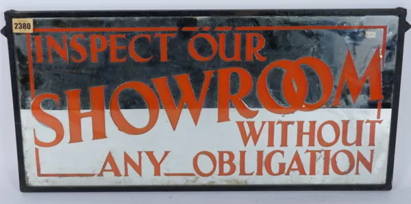 AN EARLY 20TH CENTURY MIRRORED SIGN “INSPECT OUR SHOWROOM WITHOUT ANY OBLIGATION”