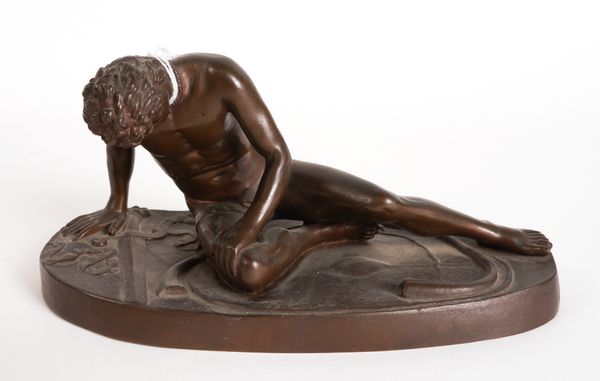 A FRENCH BRONZE OF THE DYING GAUL AFTER THE ANTIQUE CAST BY BARBEDIENNE