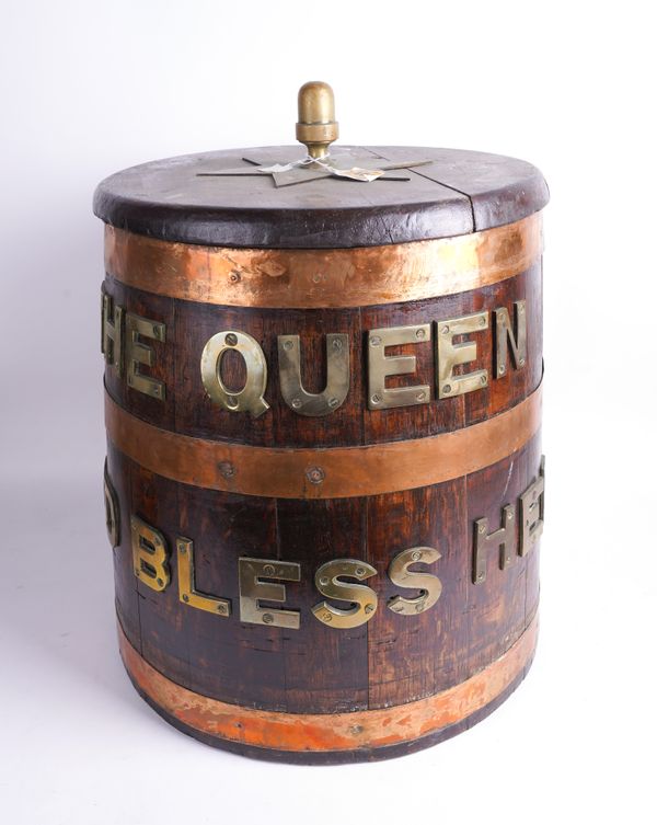 AN ENGLISH COPPER BOUND AND BRASS MOUNTED ‘THE QUEEN GOD BLESS’ STAVED OAK LOG BIN