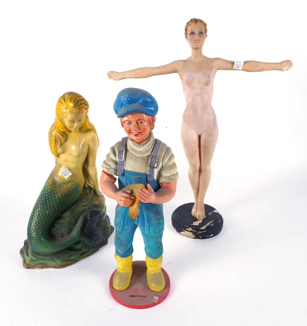 THREE MID 20TH CENTURY ADVERTISING FIGURES, AN ART DECO PLASTER LADY, A RUBBER MERMAID AND A PLASTIC FIGURE OF A BOY (3)