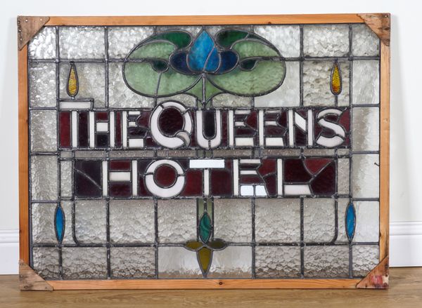 ‘THE QUEENS HOTEL’ AN EARLY 20TH CENTURY STAINED GLASS PANEL