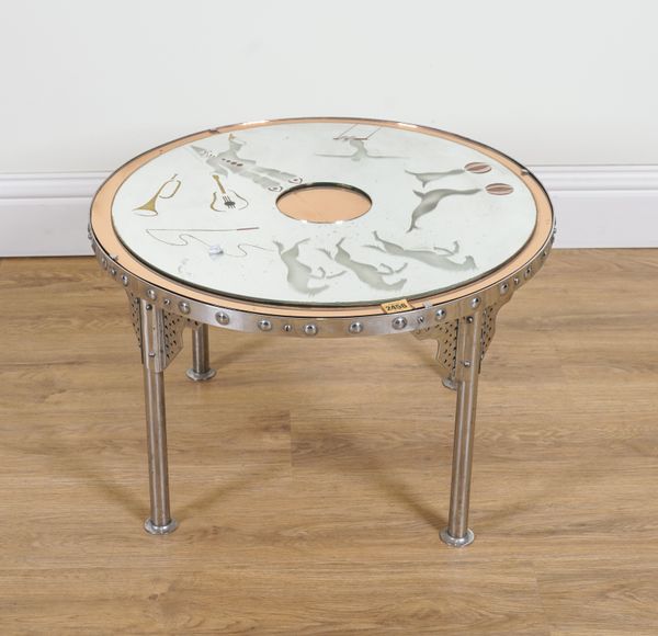 A MID 20TH CENTURY CHROME AND PINK COLOURED GLASS CIRCULAR OCCASIONAL TABLE