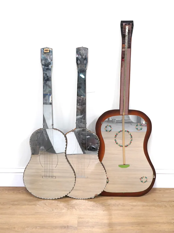 A GROUP OF THREE MODERN GUITAR SHAPED WALL MIRRORS (3)