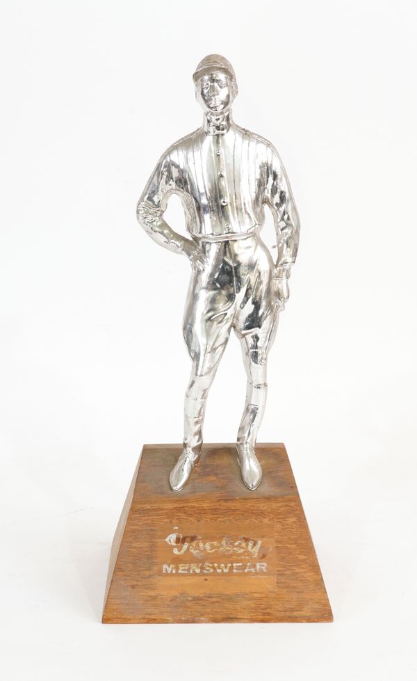 JOCKEY MENSWEAR, A MID 20TH CENTURY CHROME PLATED ADVERTISING FIGURE OF A JOCKEY.