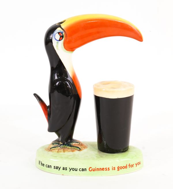 CARLTONWARE: A GUINNESS LAMP BASE FORMED AS A TOUCAN