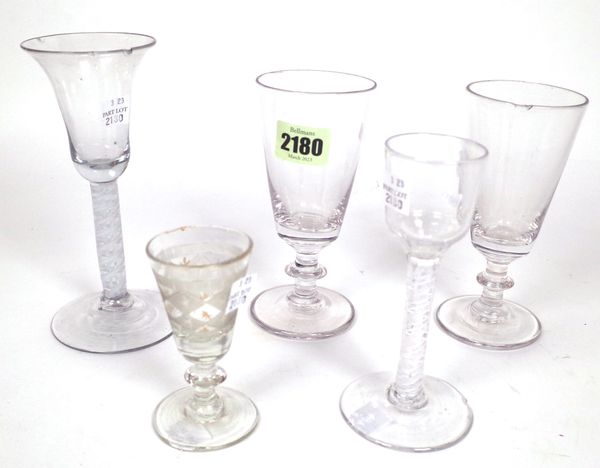 A GROUP OF FIVE DRINKING GLASSES