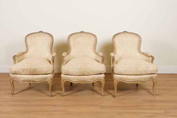 A SET OF THREE LOUIS XV STYLE SPOON BACK EASY ARMCHAIRS (3)