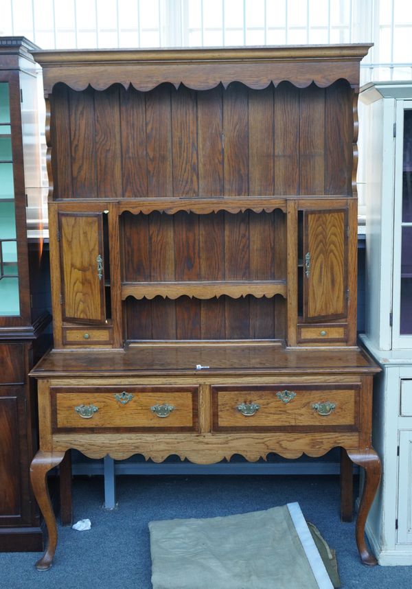 AN 18TH CENTURY STYLE MAHOGANY BANDED OAK DRESSER