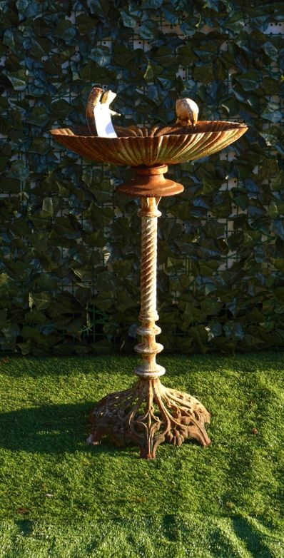 A 20TH CENTURY WHITE PAINTED CAST METAL BIRD BATH