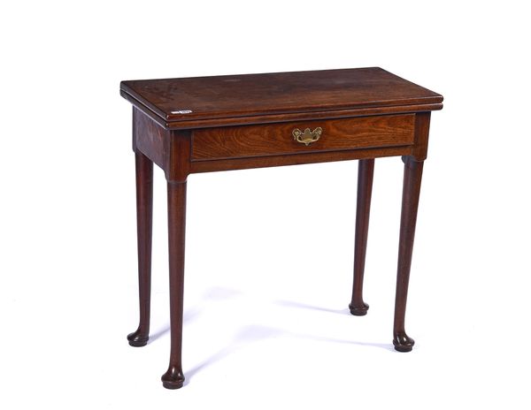 A GEORGE II MAHOGANY TEA TABLE