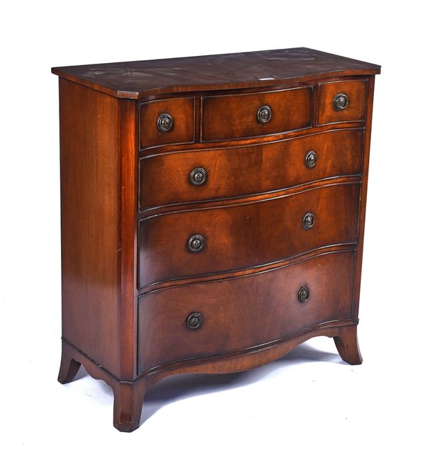 A GEORGE III STYLE MAHOGANY SERPENTINE CHEST