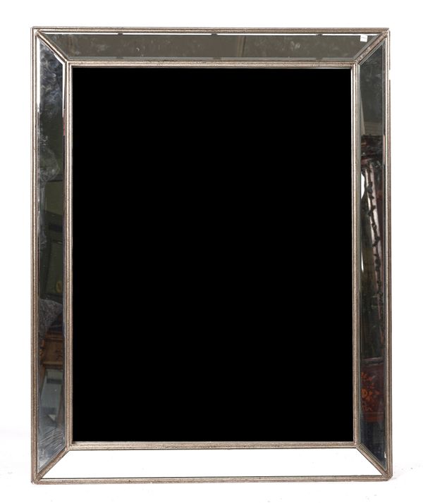 A MODERN RECTANGULAR WALL MIRROR